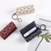 Porte-clés de luxe en cuir PU personnalisé petit porte-baume à lèvres étui portable pour rouge à lèvres sac boîte à cosmétiques