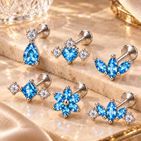 Clous d'oreilles labret à dos plat en titane G23, avec zircon bleu CZ, motif feuille et papillon, bijoux de piercing pour cartilage pour femme, hypoallergéniques