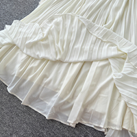 Ensemble élégant de deux pièces pour femmes, veste sans manches avec ceinture et jupe longue plissée, pour un usage quotidien