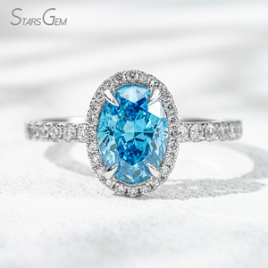 Anillo de Compromiso RST de Oro Blanco de 18K con Diamante Azul de Laboratorio de 1.5ct en Forma Ovalada y Halo - Product Image 1