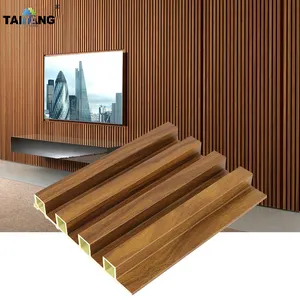 Designs de grain de bois Panneaux muraux cannelés Wpc Panneau acoustique Lambrin Wpc Decorativo De Pared