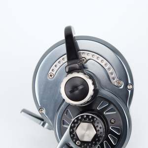 Moulinet de pêche Madox TF400R/L Jigging, rapport de transmission 6.3:<span class=keywords><strong>1</strong></span>, frein max. 30 kg, entièrement métallique, noir, pour bateau, pêche en haute mer, trolling. - Product Image 3