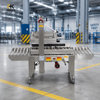 Machine à sceller les boîtes en carton semi-automatique réglable HEKON HK-5050G avec entraînement latéral gauche-droite pour commandes en gros