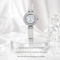 Montre pour femme, bracelet de luxe en perles, montre-bracelet vintage avec lunette en strass ronde, bracelet en alliage, montres élégantes pour femmes