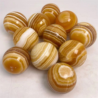 Vente en gros Cristal naturel de guérison Artisanat populaire Sphère de calcite jaune Boule de quartz pour la décoration de la maison