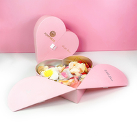 Emballage de luxe biodégradable Ensembles de soins de la peau Boîte en papier rigide rigide en carton Boîtes d'emballage à double porte de couleur rose
