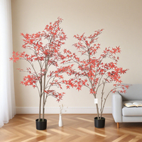 Élégant arbre artificiel en pot avec feuillage vert et base noire pour la décoration de table intérieure à la maison et au bureau