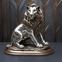 Statue d'animal de jardin extérieur poli de haute qualité Sculpture de lion assis en acier inoxydable argenté à vendre