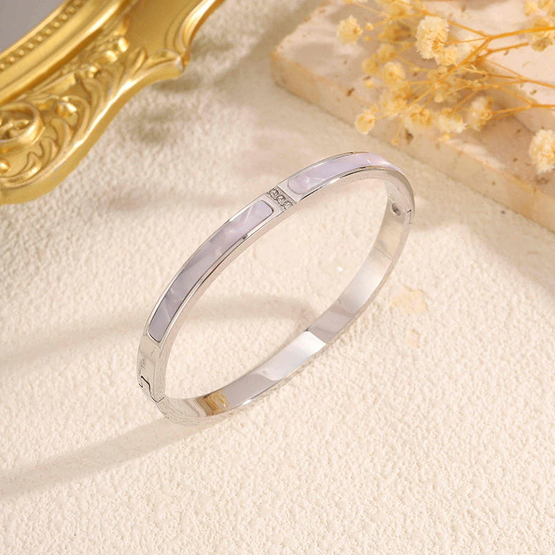 [2] bracelet en diamant et coquillage en argent