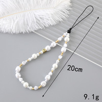 Nouvelle breloque de téléphone créative en perles et nœud papillon, tendance et polyvalente, avec chaîne de suspension pour étui, Yiwu pour femmes