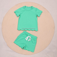 Ensemble de vêtements deux pièces respirant de couleur unie pour l'été, haut et short, tenue à volants pour filles, pour un usage quotidien décontracté