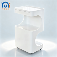 Chariot de rangement mobile incurvé brillant pour salon de beauté avec tiroir et armoire pour spa des ongles, salon de coiffure et de beauté