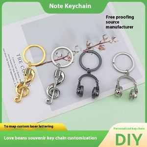 <span class=keywords><strong>Porte</strong></span>-clés personnalisable en métal avec casque Bluetooth et <span class=keywords><strong>instrument</strong></span> de <span class=keywords><strong>musique</strong></span>, petit <span class=keywords><strong>cadeau</strong></span> transfrontalier pour Noël - Product Image 3