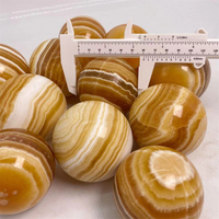 Vente en gros Cristal naturel de guérison Artisanat populaire Sphère de calcite jaune Boule de quartz pour la décoration de la maison