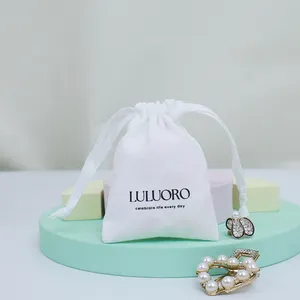 Белая защита на заказ, оптовая продажа, хлопковая муслиновая подарочная упаковочная сумка с лентой для ювелирных изделий