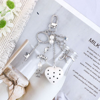 Vente en gros Y2K arc amour coeur sac breloque porte-clés accessoires élégant tendance nœud papillon étoile téléphone chaîne sac à dos pendentif porte-clés