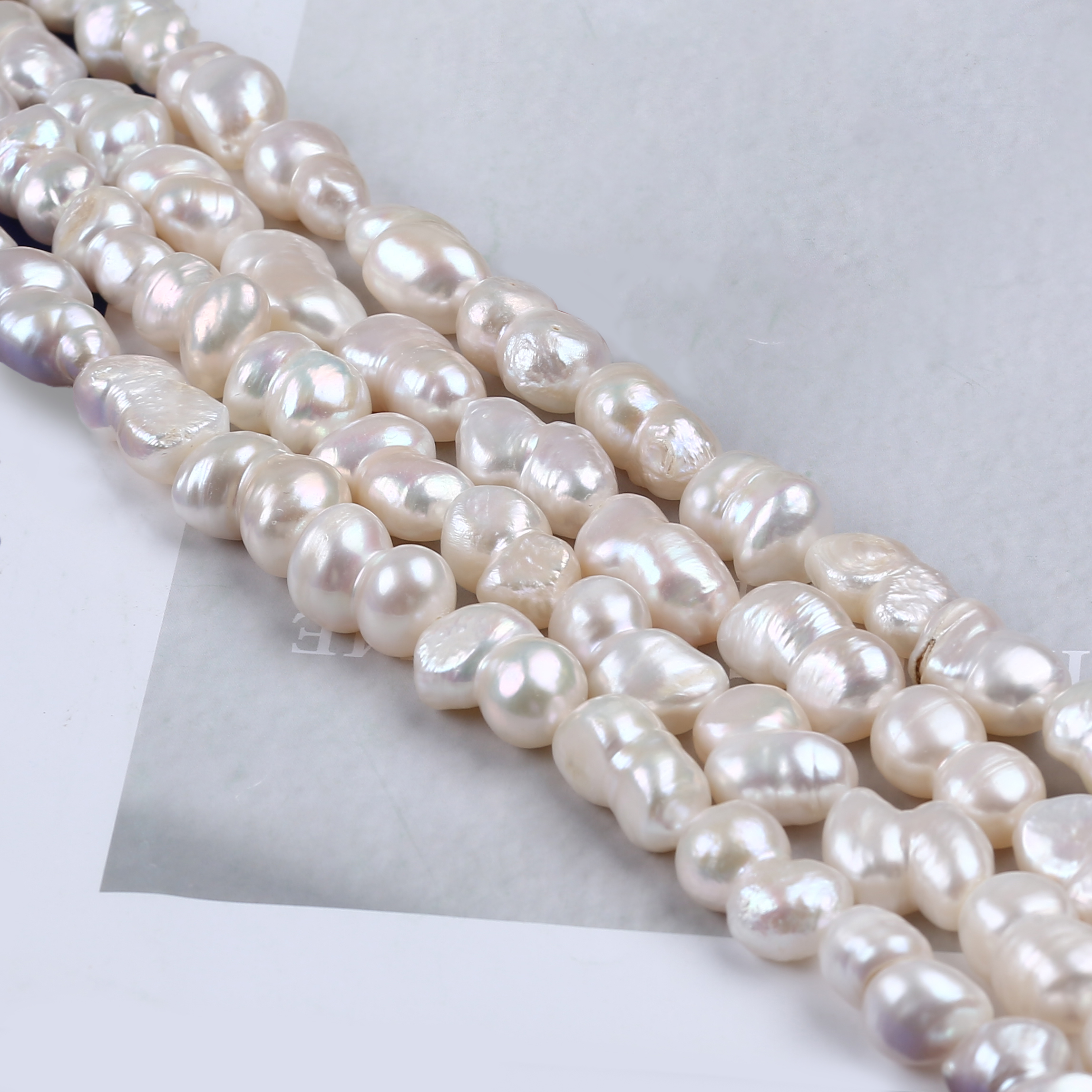 ひょうたん形ホワイトバロックパールビーズストランド淡水