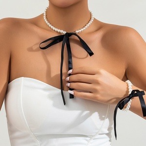 Elegante <span class=keywords><strong>Collana</strong></span> Girocollo Boho <span class=keywords><strong>con</strong></span> <span class=keywords><strong>Perle</strong></span> Finte e <span class=keywords><strong>Fiocco</strong></span> in Nastro, <span class=keywords><strong>Collana</strong></span> Girocollo Vintage <span class=keywords><strong>con</strong></span> <span class=keywords><strong>Perle</strong></span> per Feste <span class=keywords><strong>di</strong></span> Compleanno, Gioielli per Donne - Product Image 1