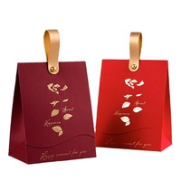 Boîte en papier de spécialité rose dorée Boîte à bonbons de mariage pour mariages Sac cadeau de bonbons imprimé avec poignée