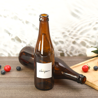 Botella de Vidrio Redonda Marrón Semitransparente de 250 ml y 550 ml para Vino, Bebidas y Cerveza, con Tapa Corona y Logotipo Personalizado