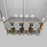 Ensemble de table à manger rectangulaire avec plateau en verre miroir et base en acier inoxydable doré
