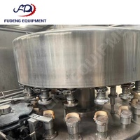 Machine de remplissage et de scellage de canettes à remplissage à chaud d'occasion, pour la stérilisation et l'extension de la durée de conservation des jus et des boissons protéinées végétales
