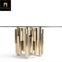 Nouveau design de table de salle à manger de luxe haut de gamme table à manger à base cylindrique irrégulière en acier inoxydable doré pour la salle à manger à la maison