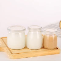 Gobelets en verre résistant à la chaleur en gros avec couvercles en bois naturel 100ml 150ml 200ml pour la pâtisserie et l'emballage de desserts