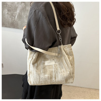 Nouveau sac fourre-tout de style chinois pour femmes, avec chaînes, bandoulière simple, grande capacité, portable, simple, tendance, polyvalent pour les loisirs et le travail