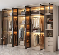 Armoire avec cadre métallique, portes en verre, éclairage LED intérieur, tringle de suspension, étagères, placard modulaire, ensemble moderne de luxe pour chambre à coucher