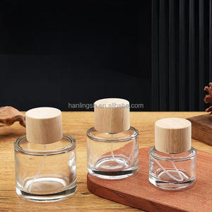 Venta caliente 30ml 50ml 100mL Perfume redondo Engarzado <span class=keywords><strong>en</strong></span> botella de vidrio con bomba tapa de madera para Perfume loción Perfume botella de vidrio - Product Image 2