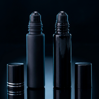Vente en gros de flacons à bille en cristal semi-précieux de 10 ml, flacon en verre noir pour massage des yeux, distributeur d'huile essentielle pour parfums et cosmétiques