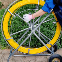 Ruban de pêche en fibre de verre tiges de câble ruban de poisson conduit Rodder extracteur de fil avec cage et support de roue