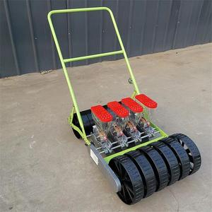 Sembradora Manual Verde de 2 Filas con Tolva Roja y Ruedas Negras para Plantar Vegetales - Product Image 4