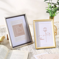 Nueva llegada regalos de estilo europeo de escritorio minimalista decoración del hogar cuadro de mesa hueco foto Marco de resina