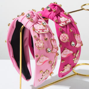 Serre-tête tendance style cowgirl avec strass roses et breloques chapeau et bottes pour femme - Product Image 1