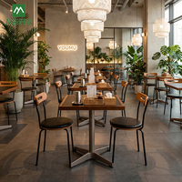 Meubles de gros pour hôtels et restaurants : Table et chaise de salle à manger modernes et écologiques pour café, avec structure métallique et plateau en pierre frittée
