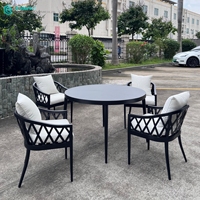 Ensemble de mobilier de jardin moderne et durable en aluminium avec chaises de salle à manger et table ronde pour villa, cour et hôtel