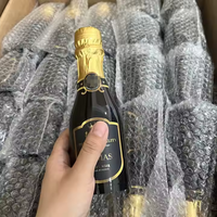 Botol berbentuk sampanye kemasan permen plastik hitam unik untuk perayaan hadiah Jelly coklat makanan karet kunyah