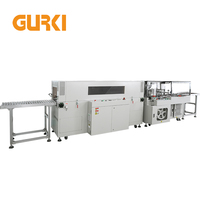 Machine d'emballage sous film rétractable GURKI à scellage continu - Automatique, électrique, haute température, pour aliments, boissons, produits chimiques, textiles