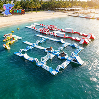 Parc aquatique gonflable commercial robuste en PVC de 0,9 mm, parcours d'obstacles aquatiques scellé, flottant sur l'eau de mer