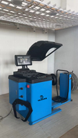Localisation laser Équilibreuse de roue de camion Équilibreuse de roue avec élévateur de pneu Équilibreuse de pneu d'atelier