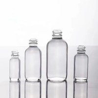 Bouteilles en verre rondes transparentes de 250 ml et 500 ml avec pompe pour le lavage des mains, logo personnalisé et boîtes cadeaux de luxe