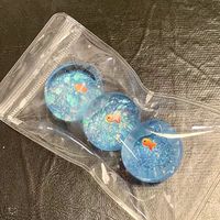 Nouvelle figurine anti-stress en caoutchouc thermoplastique en forme de poisson rouge Ocean Planet avec paillettes, jouet de décompression, breloque de sac et pendentif