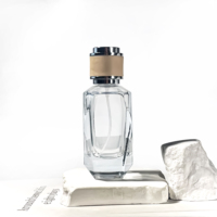 Bouteilles de pulvérisation d'atomiseur d'emballage en verre de 50ml rectangulaires faites sur commande de luxe bouteille de parfum en verre vide