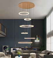Lustre circulaire moderne et luxueux en acrylique - Éclairage LED pour salon avec finition dorée, dimmable, taille moyenne, garantie de 3 ans