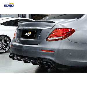 طقم ترقية ناشر خلفي وأطراف عادم بتصميم AMG من GUGO لسيارات مرسيدس بنز الفئة E W213 ذات الأربعة أبواب موديل 2017 فما بعد، مناسب لمصدات سيارة بنز E63 الجديدة لعام 2019 - Product Image 5