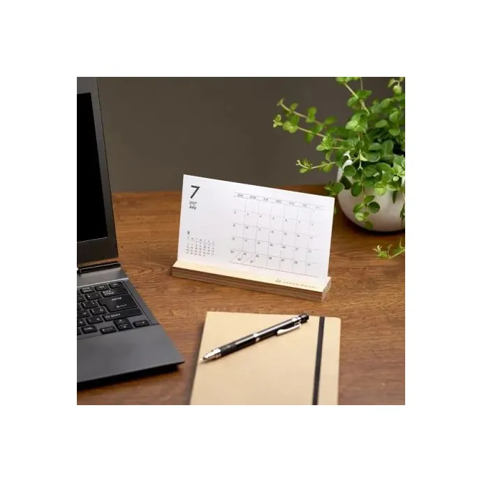 With a simple design that uses forest thinnings printed stand calendar with wood