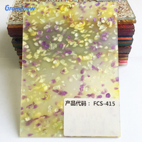 Feuilles fantaisie en acrylique-celluloid de couleur bleue avec paillettes, comme matériau de décoration