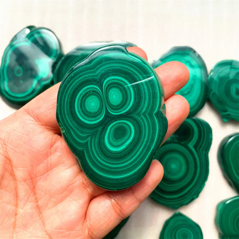 Wholesale natural 3-9cm malachite slab with nice circle healing stones for decoration